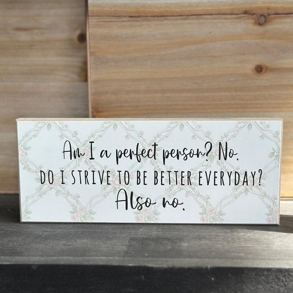 Decorative sign with motivational quote on a wooden surface available at Rustic Ranch Furniture in Airdrie