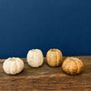 pumpkin-shaped candle holders in off-white, cream, tan, and light brown tones, are available at Quilted Cabin in Airdrie