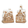 Two small gingerbread houses with lots of snow on the roof available at Quilted Cabin Home DEcor.