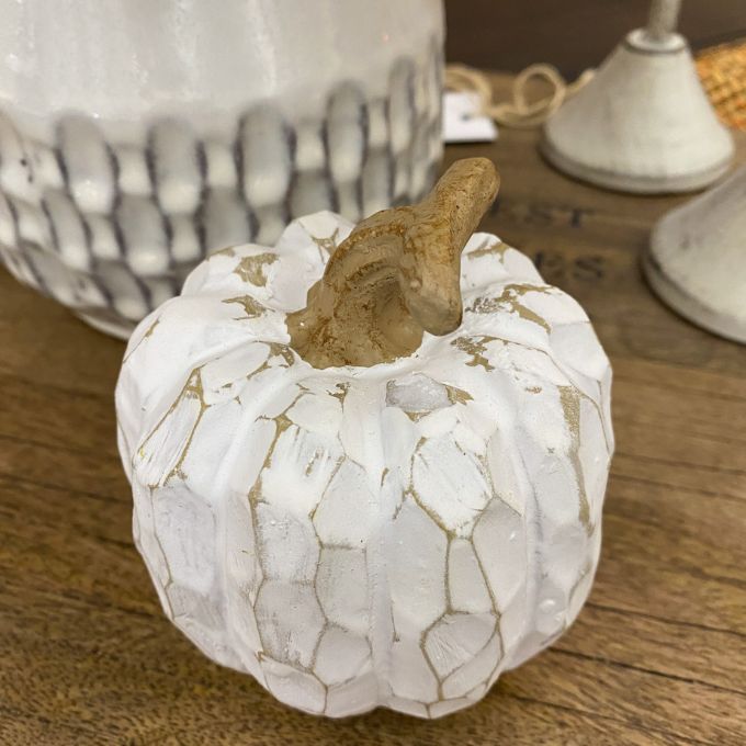 Decorative white pumpkin  on a wooden surface, the White Carved Pumpkins - Two Styles available at Quilted Cabin Home Decor.