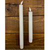 Two white candles with flame tips on a wooden surface. White Ridged LED Timer Taper Candles - Two Sizes available at Quilted Cabin Home Decor.