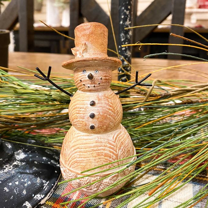 Wood Look Snowman Figurine is available at Quilted Cabin Home Decor.