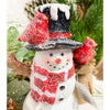 A resin snowman with a black top hat and red scarf is a figurine for your holiday decor. It has red cardinals on its hat and arm. Available at Quilted Cabin Home Decor.