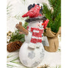 A resin snowman with a black top hat and red scarf is a figurine for your holiday decor. It has red cardinals on its hat and arm. Available at Quilted Cabin Home Decor.