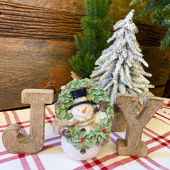 JOY Snowman Figurine is a three piece figurine that spells out JOY, with a snowman being the letter O. Available at Quilted Cabin Home Decor.