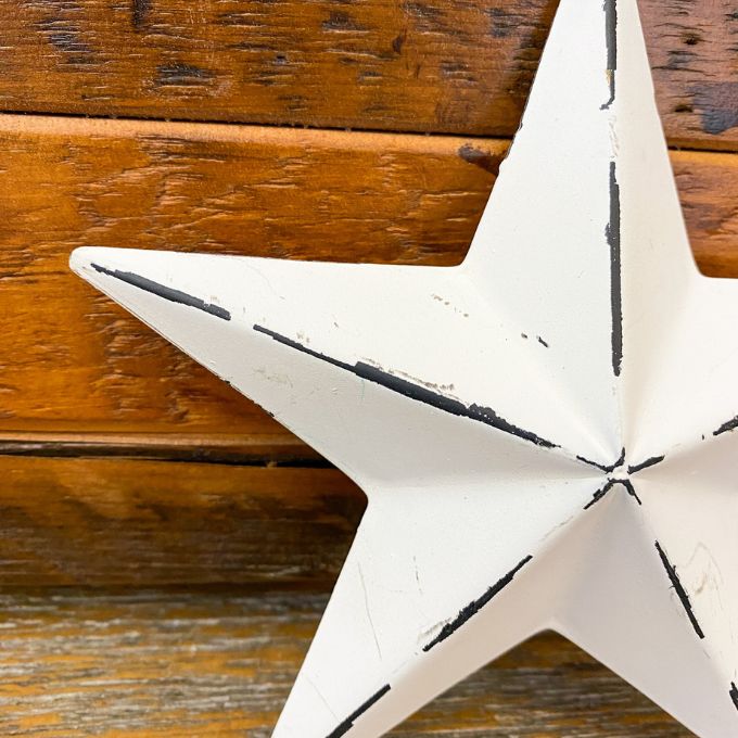 White Metal Star is available at Quilted Cabin Home Decor.