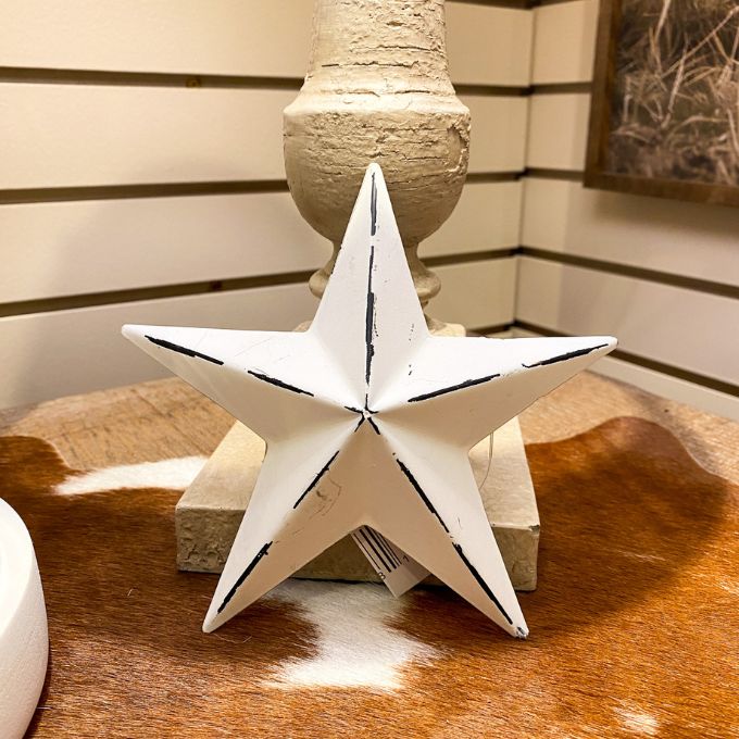 White Metal Star is available at Quilted Cabin Home Decor.