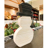 Wooden Snowman Block has a white corrugated body and black corrugated top hat. Available at Quilted Cabin Home Decor