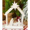 A farmhouse white distressed wooden cutout of the nativity scene under the Christmas star in the creche. The Distressed White Nativity cutout is a silhouette style nativity and available at Quilted Cabin Home Decor.