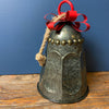 Dark Galvanized Sculpted Bell with Bow Hanger available at Quilted Cabin Home Decor.