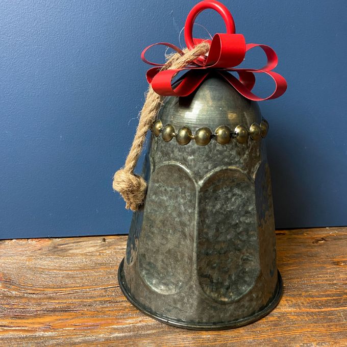 Dark Galvanized Sculpted Bell with Bow Hanger available at Quilted Cabin Home Decor.