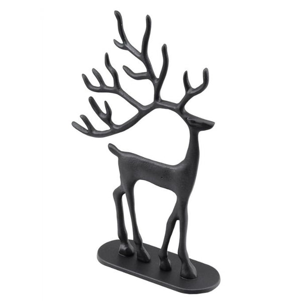 A matte black metal deer jewelry organizer shaped like a standing deer with antlers, mounted on a flat oval base, shown against a plain white background available at Quilted Cabin in Airdrie
