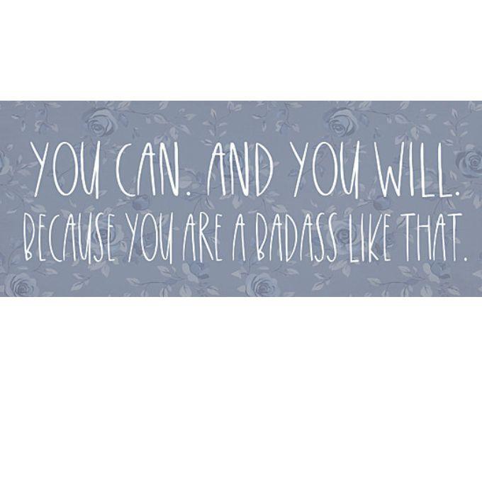 Motivational sign with text on a wooden floral surface available at Quilted Cabin in Airdrie