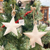 White Star Ornaments - Three Sizes are white hammered metal stars that hang from jute. Available at Quilted Cabin Home Decor.