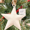 White Star Ornaments - Three Sizes are white hammered metal stars that hang from jute. Available at Quilted Cabin Home Decor.