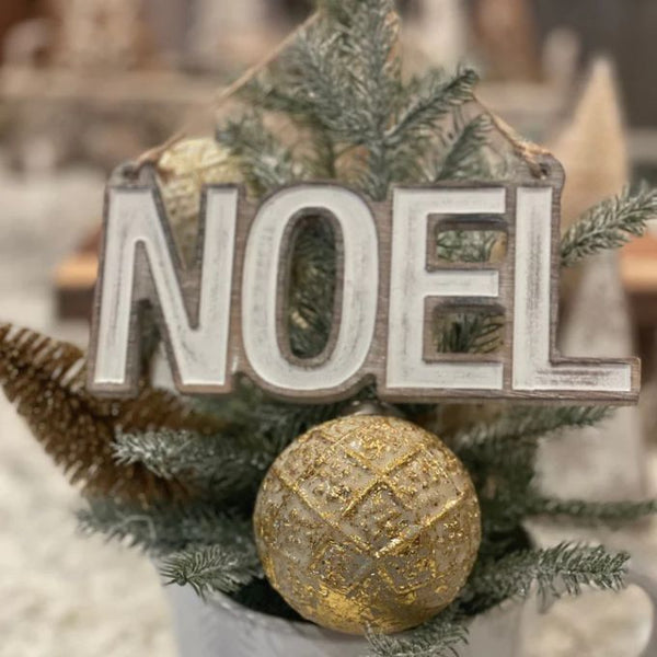 NOEL Carved Ornament available at Quilted Cabin  Home Decor.