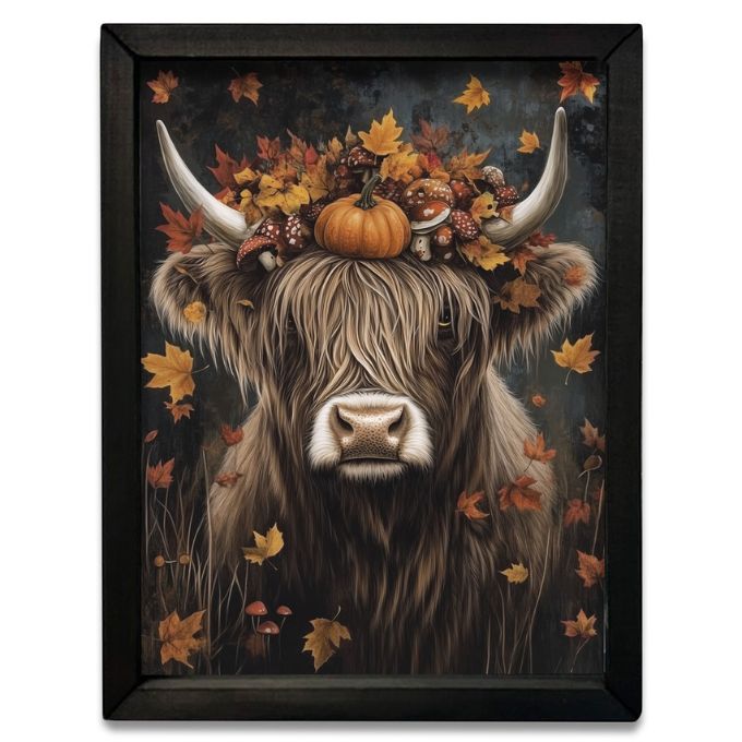 Framed artwork of a highland cow with autumn leaves and pumpkins. Fall Highland Cow Box Frame Wall Art available at Quilted Cabin Home Decor.