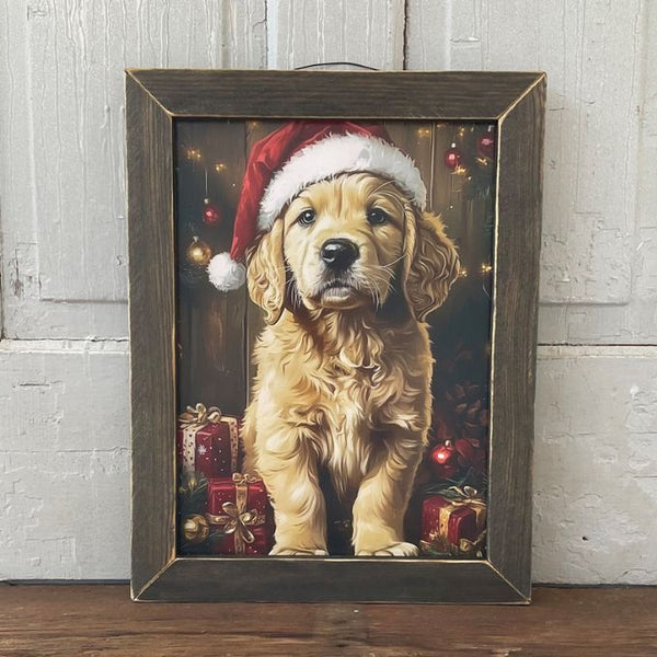 Framed artwork of a dog wearing a Santa hat with Christmas decorations. Christmas Golden Retriever Framed Print available at Quilted Cabin Home Decor.