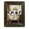 Decorative wall art with three baby cows in a bathtub, framed in a brown lath frame. Three Holsteins in a Vintage Tub Framed Art available at Quilted Cabin Home Decor.