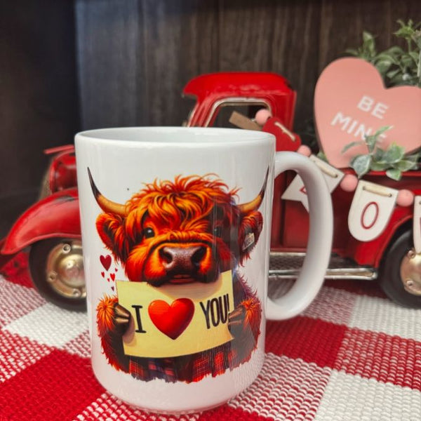 Baby Highland Cow with I Love you Sign Mug available at Quilted Cabin Home Decor.