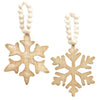 White distressed wooden snowflake ornaments in two different styles on white beaded hangers available at Quilted Cabin Home Decor.