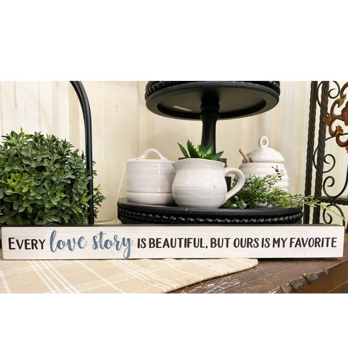 Every Love Story is Beautiful Shelf Sign available at Quilted Cabin Home Decor in Airdrie Alberta.