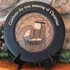 Celebrate the true meaning of Christmas wooden plate is shown. This is a wooden plate, painted in the primitive farmhouse style. This plate shows Mary and Joseph at the manger. The words Celebrate the true meaning of Christmas is painted around the rim.