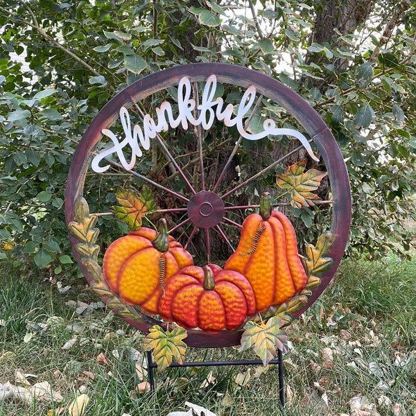 Pumpkin Wagon Wheel Garden Stake available at Quilted Cabin Home Decor.
