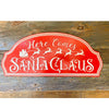 Here Comes Santa Claus Metal Sign available at Quilted Cabin Home Decor.