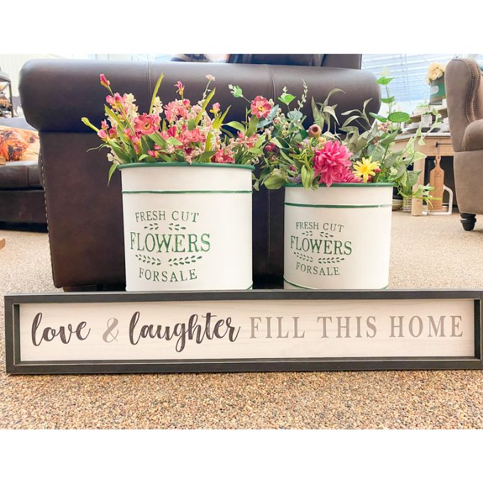 Love and Laughter Fill This Home Sign available at Quilted Cabin Home Decor.