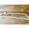 White Wooden Beaded Garland available at Quilted Cabin Home Decor.