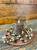 metal round candle tray with stars available at quilted cabin home decor.