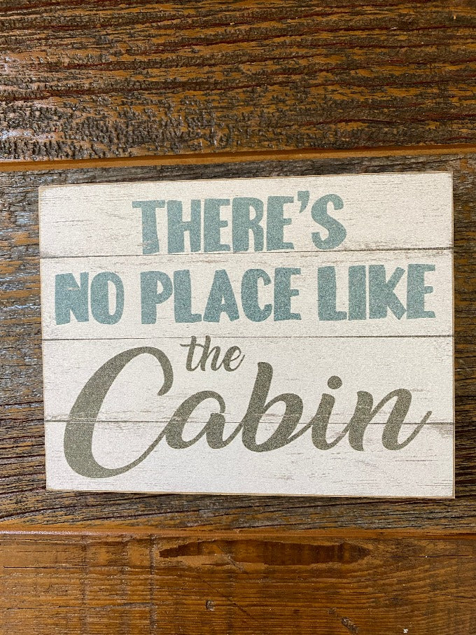 There's no place like the cabin plank look wood sign.