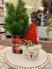The red and black buffalo plaid vintage christmas metal can that says Good Tidings of Great Joy . 