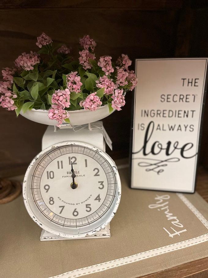 The Seasoned with Love Kitchen Sign is shown with the White Scale Kitchen Clock