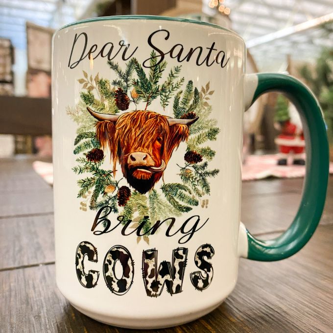 Santa Bring Cows Christmas Mug available at Quilted Cabin Home Decor.