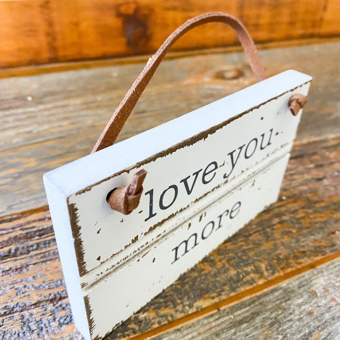 Love You More Chippy Ornament available at Quilted Cabin Home Decor