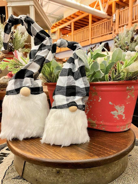 Black and white checked hats make these gnomes perfect for the holidays. They have a full bushy faux fur beard and there is wire in the hat that allows you to move the hat in a number of different angles.