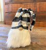 This is a black and white checked hat gnome. The gnome has a bushy faux fur beard and wire in the hat allows you to move the hat in a number of directions.