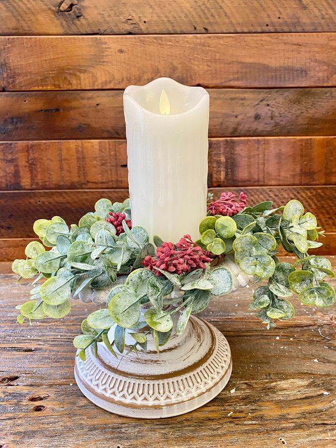 The candle ring of the holiday eucalyptus collection. White dusted eucaluptus leaves with red berries incorporated throughout. 