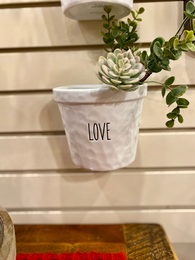 White Ceramic Hanging Pots - Three Styles available at Quilted Cabin Home Decor. The Love pot is shown.
