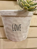 White Ceramic Hanging Pots - Three Styles available at Quilted Cabin Home Decor. The Love Pot is shown.