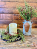 The Evergreen Pine with Red berries wreath and pick feature green pine-like stems, and red berry pips and pine cones. 