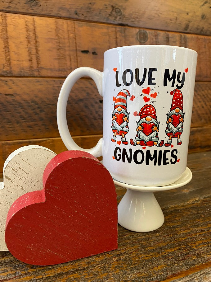 Love My Gnomes mug features three gnomes all holding hearts with red hats.