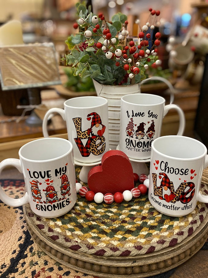 The Valentine's Day Gnome Mug collection from Quilted Cabin.