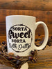 A white ceramic mug that says Sorta Sweet Sorta Beth Dutton on one side and on the other side says I don't speak dipshit.