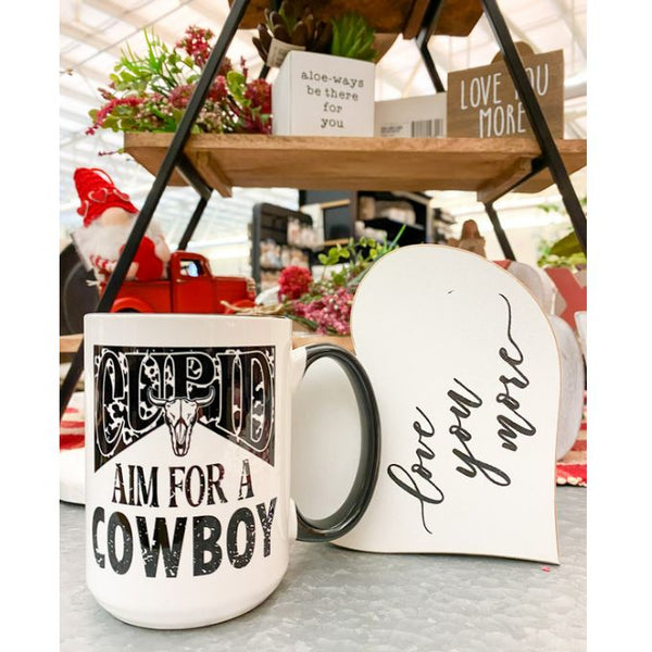 Cupid Aim for a Cowboy Mug available at Quilted Cabin Home Decor.