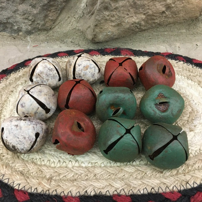 Bag of Metal Distressed Bells available at Quilted Cabin Home Decor.
