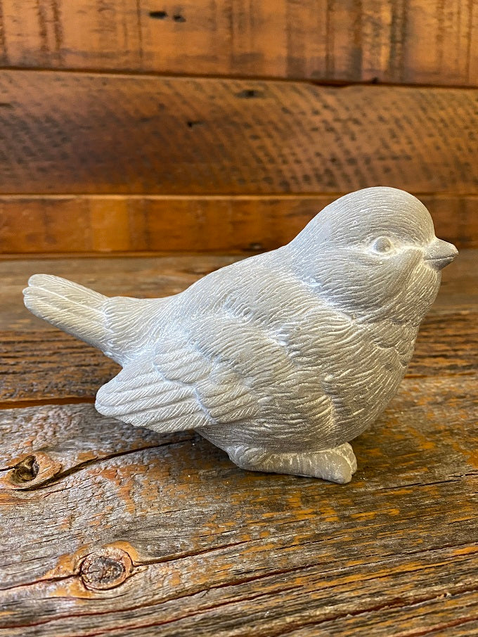 A grey resin bird. Lots of great details in the wings.