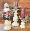  Distressed white wooden candle handles in three sizes are shown with farmhouse Christmas decor.